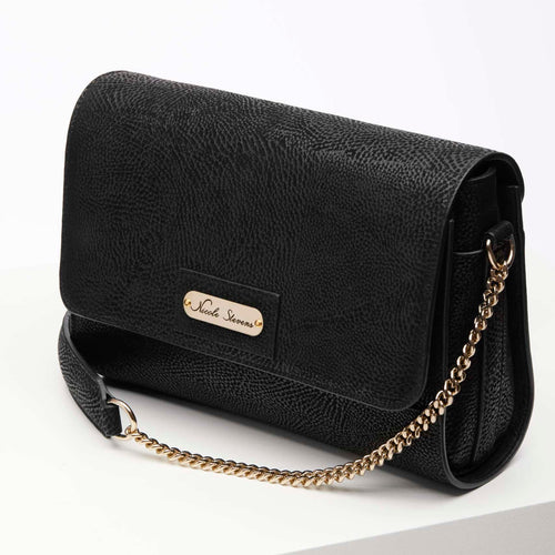 Alt="Elegant Maison Italian Shoulder Bag in classic black leather, featuring a sophisticated texture and a chic gold chain strap, available only at Pink Maison."